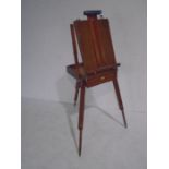 A wooden travelling field easel