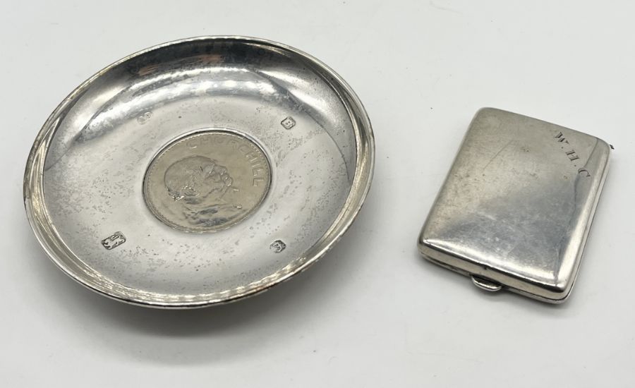 A hallmarked silver stamp case along with a silver dish with inset Commemorative Crown