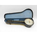 An eight string banjolele with case