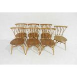 A set of seven Ercol blonde lattice back (model 376) dining chairs - 1 A/F