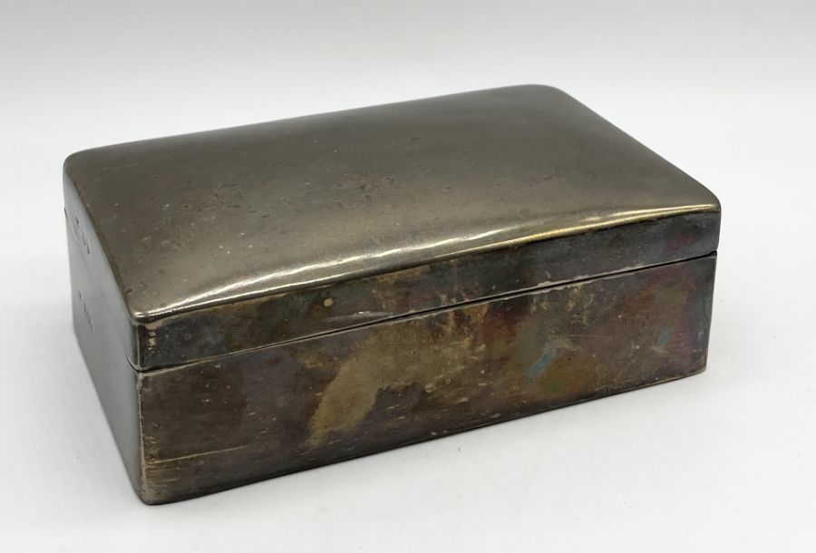 A hallmarked silver cigarette box