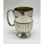 A hallmarked silver Christening mug, London 1904, weight 104.4g