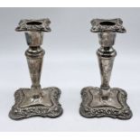 A pair of hallmarked silver candlesticks, Birmingham 1901, height 11.5cm