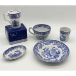 A collection of Spode Blue Room china including oversized teacup and saucer along with three blue