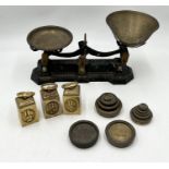 A set of painted scales along with a number of weights including broad arrow stamped examples, Avery