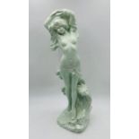 A pottery figure group of a nude lady - height 60cm