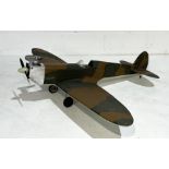 A vintage hand built radio controlled model of a Spitfire, wingspan 140cm, no controller present