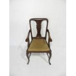 A well proportioned Queen Anne style carver chair on cabriole legs