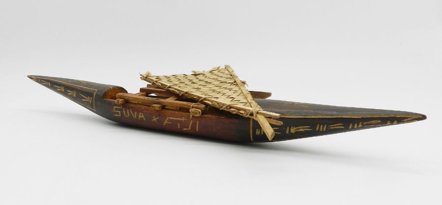 A model boat along with a tribal wooden model of an outrigger (A/F) - Image 4 of 6