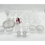 A collection of various cut glass including ships decanter, champagne flutes etc.