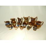 A collection of Victorian copper lustre-ware including jugs, goblets etc. - some A/F