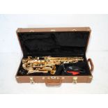 A Blessing Elkhart saxophone with hard fitted case and strap