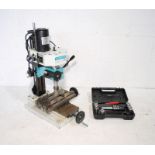 An Axminster Model Engineer Series vertical mill/pillar drill (model 505098) with boxed bit set