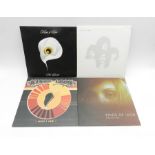 Four 10" vinyl records by Kings Of Leon comprising of 'Youth And Young Manhood' double album, '