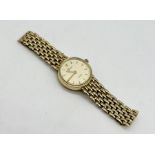 A "Geneve Gold" 9ct gold wristwatch on 9ct strap, total weight 15g