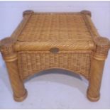 A Harrods wicker coffee table.