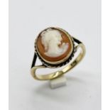 A 9ct gold ring set with a cameo