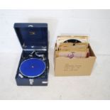 An HMV portable gramophone along with a quantity of records including Duke Ellington, Fats Waller,