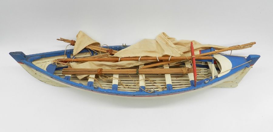 A model boat along with a tribal wooden model of an outrigger (A/F) - Image 6 of 6