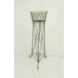 A small Victorian green painted wirework garden planter - height 81cm