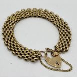 A 9ct gold link bracelet with padlock, weight 14.7g