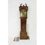 A Georgian inlaid mahogany longcase clock with barley twist supports and ornate brass dial with hand