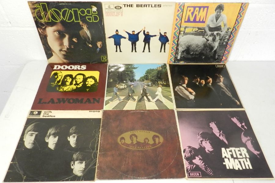 A small collection of 12" and 7" vinyl records comprising of The Doors, The Beatles, Paul and - Image 3 of 5