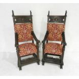 A pair of early 19th century copies of 16th century carved fruitwood Belgian throne chairs with