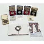 A collection of five cased silver proof crowns and a 1902 Wolverhampton Coronation souvenir