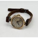 A Victorian ladies 9ct rose gold watch on leather strap