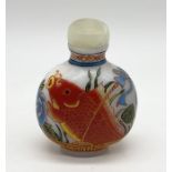 A Chinese snuff bottle with Koi carp design and signature to base