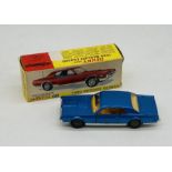 A boxed Dinky Toys Ford Mercury Cougar (174) in metallic blue with orange/yellow interior and cast