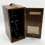 An early 20th century oak cased W. Watson & Sons London "Kima" microscope numbered 91070 in original
