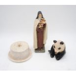 A Sylvac panda along with a Sylvac cheese dish and a religious figure