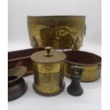 A brass oval coal bucket with lion head finials along with some brass and copper ware including a