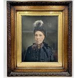 A 19th century oil of a woman in typical Victorian dress - 37cm x 29cm