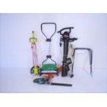 A selection of modern garden equipment including a Brill Razorcut Premier 33 mower, a Black and