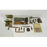 A quantity of various tools and accessories including three draw knives, pulley and chains, tap