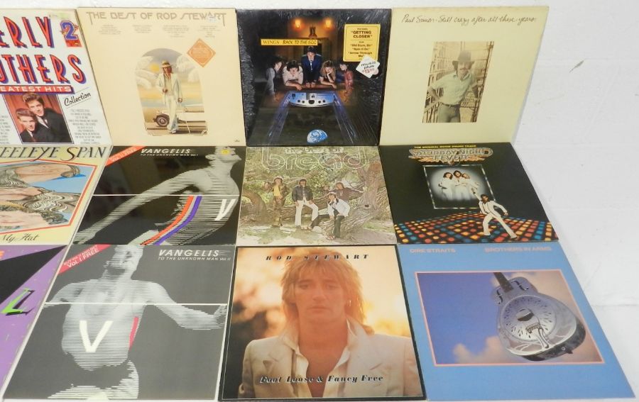 A quantity of 12" and 7" vinyl records including The Who, The Beatles, The Doors, Elvis Costello and - Image 6 of 7