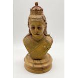 A resin bust of Queen Victoria on turned wooden base - height 38cm