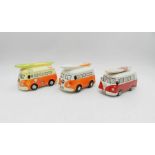 Two novelty money banks in the form of campervans and one other