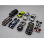 A collection of nine vintage Hornby Scalextric cars including two Bugatti Veyron's, Audi, Nissan