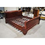 An Emperor size sleigh bed - 228cm x 206cm