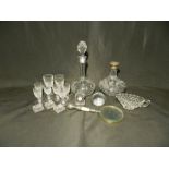 A quantity of cut glass including decanters (one with hallmarked silver rim), Waterford liqueur