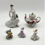 A collection of Russian made ceramics including teapot, dancing figure etc.