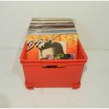 A quantity of 12" vinyl records including Buddy Holly, Bert Weedon, Jimmy Shand, Billy Connolly,