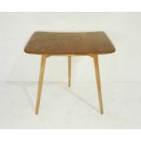 An Ercol blonde table extender raised on three tapering legs (model 265) - length 71cm, depth