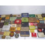 A large collection of vintage (mostly tobacco or smoking related) tins. One tin contains a small