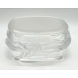 A Lalique oval lidded box decorated with a bow -signed to base