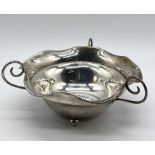 A silver 3 handled bowl with flared rim, weight 68.6g